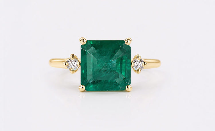 Asscher cut lab grown diamond three stone ring with two side stones