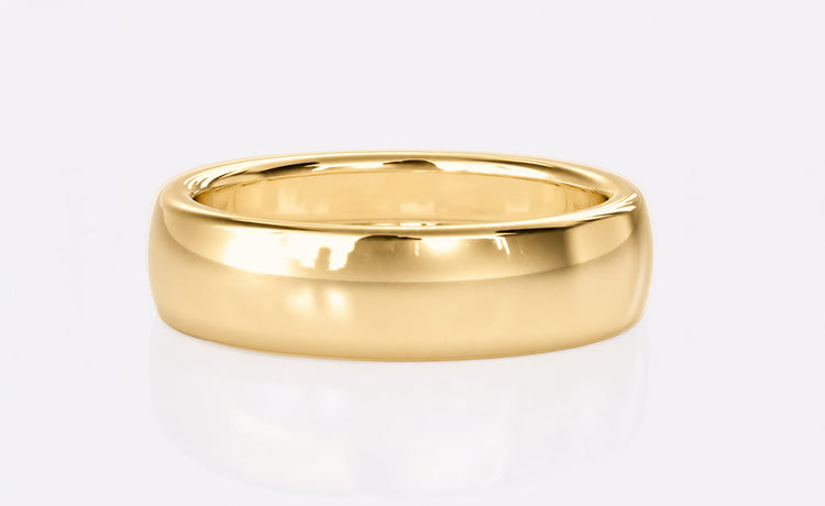 Classic plain wedding band in solid gold with a comfort fit profile