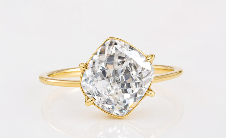 Loose cushion cut moissanite with a soft square outline and brilliant faceting