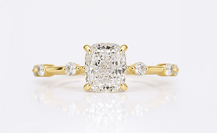 Cushion cut lab grown diamond ring with a pave set diamond band