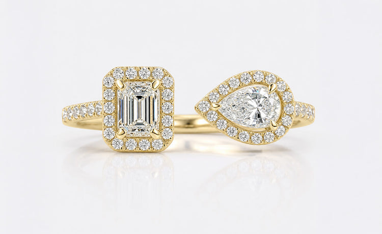 Emerald cut lab grown diamond halo ring framed by pave set diamonds