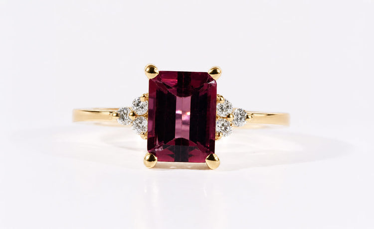 Emerald cut lab grown diamond and moissanite rings with step cut centre stones