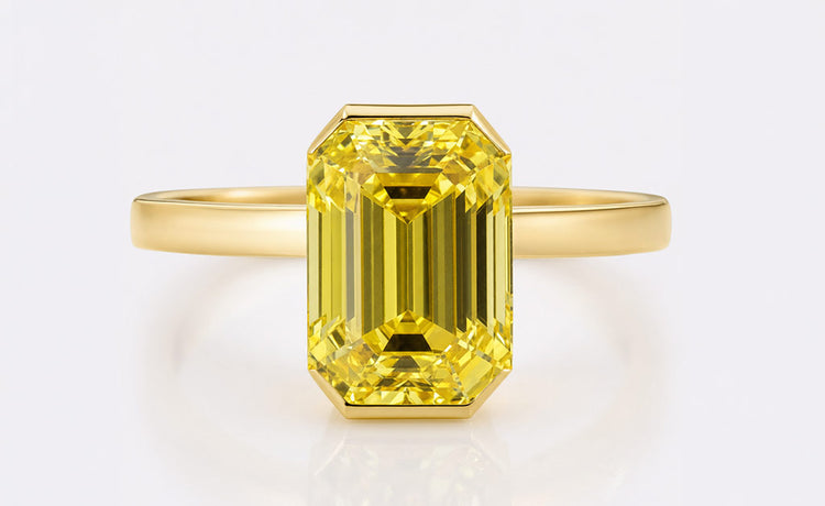 Emerald cut lab grown diamond jewellery including rings and earrings