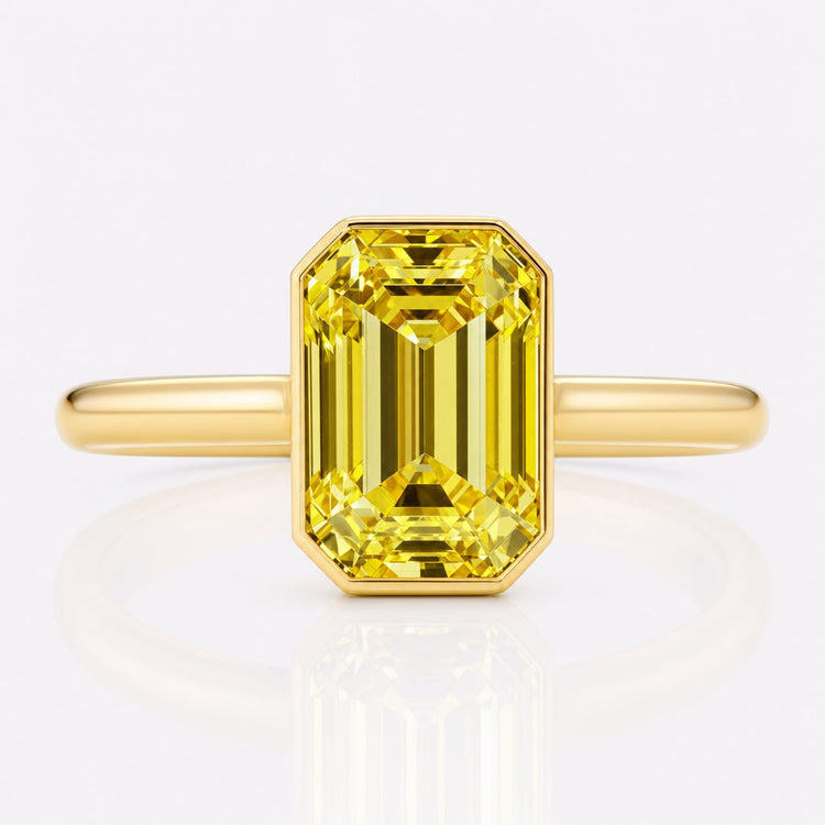 Loose emerald cut lab grown diamonds with stepped rectangular faceting