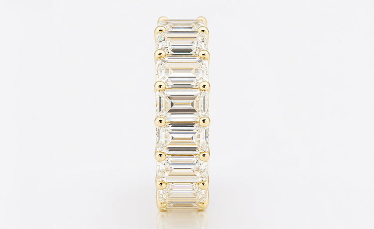 Emerald cut moissanite wedding ring in solid gold