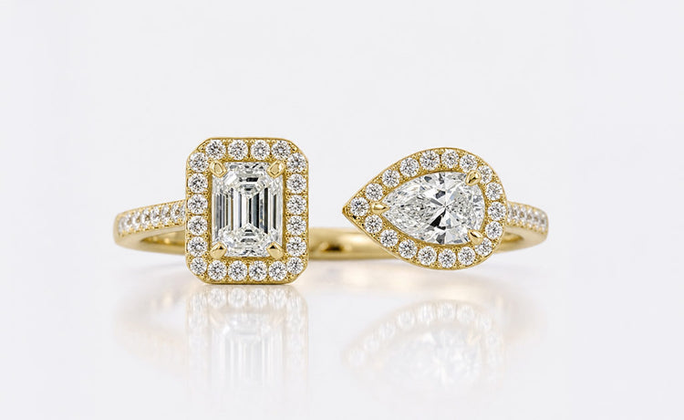Emerald cut lab grown diamond toi et moi ring with two stones set side by side
