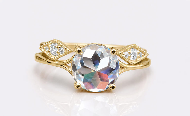 Fine moissanite jewellery including pendants, earrings and bracelets in solid gold