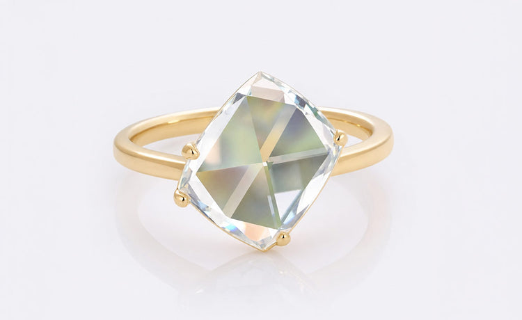 Grey moissanite stone with a smoky silver tone