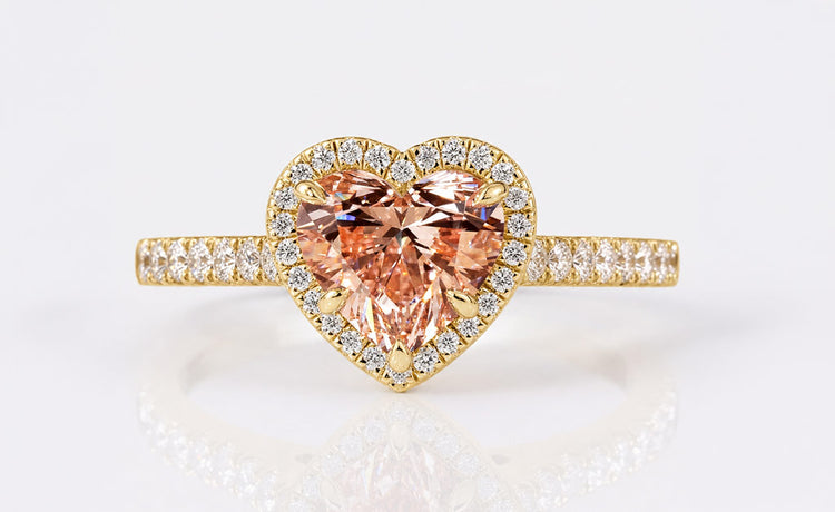 Heart cut lab grown diamond halo ring framed by pave set diamonds