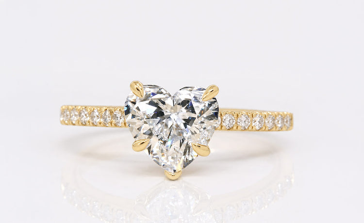 Heart cut lab grown diamond ring with a pave set diamond band