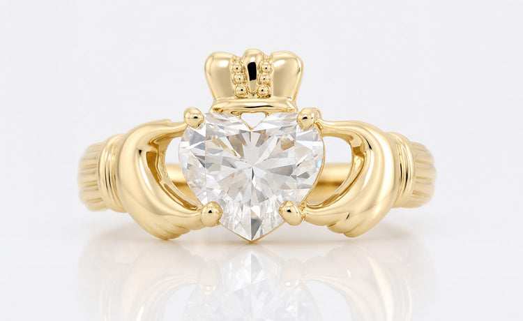 Heart shaped moissanite engagement ring in a solid gold setting