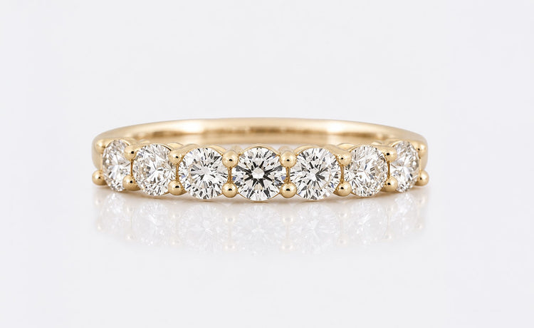Lab grown diamond anniversary ring set with a row of round brilliant cut diamonds