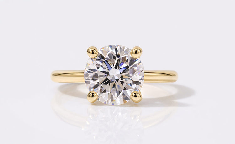 Lab grown diamond earrings as gift ideas including studs and hoops in solid gold