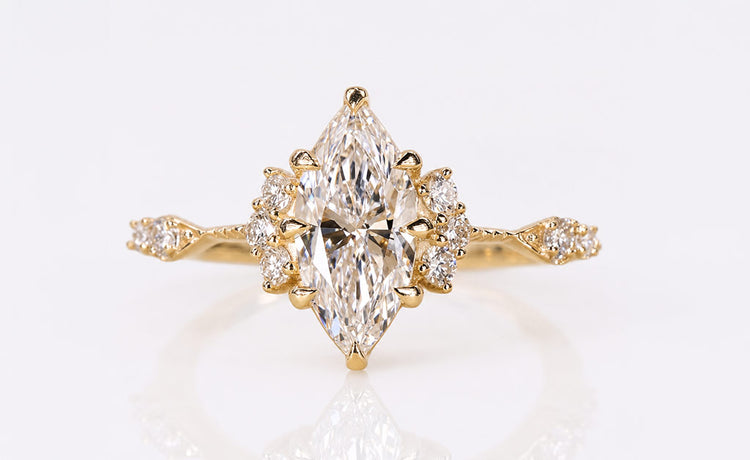 Vintage style marquise cut lab grown diamond ring with milgrain detailing