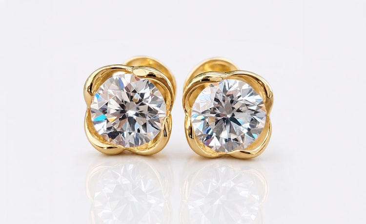 Moissanite earrings as gift ideas including studs and hoops in solid gold