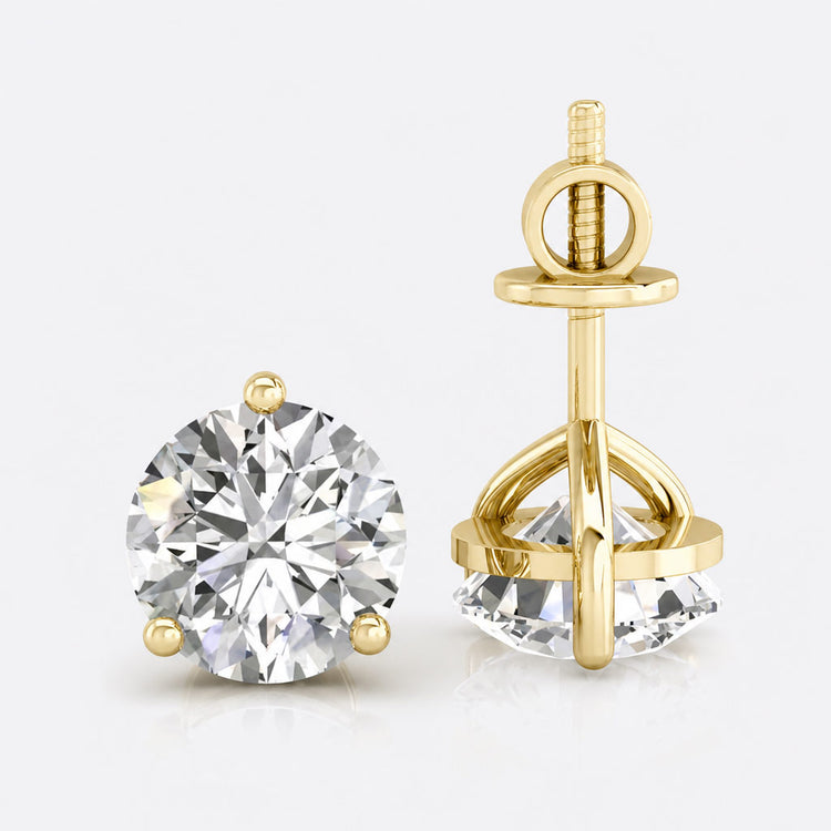 Moissanite earrings including studs, hoops and drops in solid gold settings