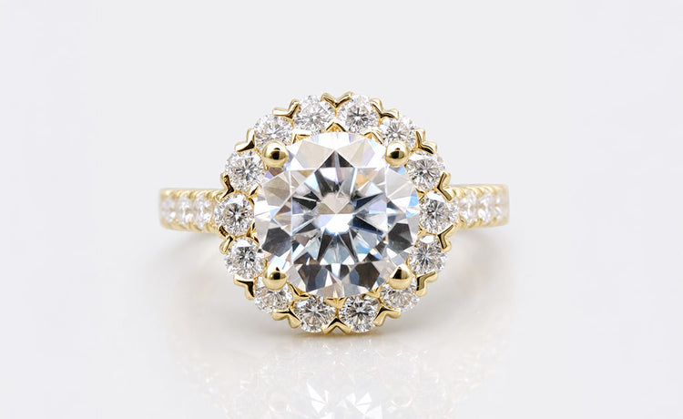 Moissanite pave engagement ring with small stones set along the band