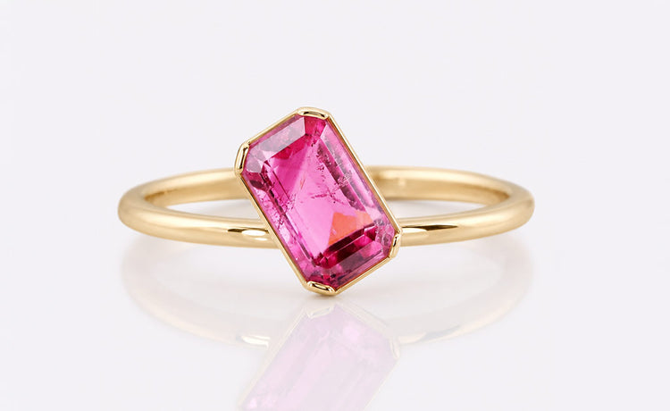 Natural gemstones including emerald, ruby, sapphire and tourmaline