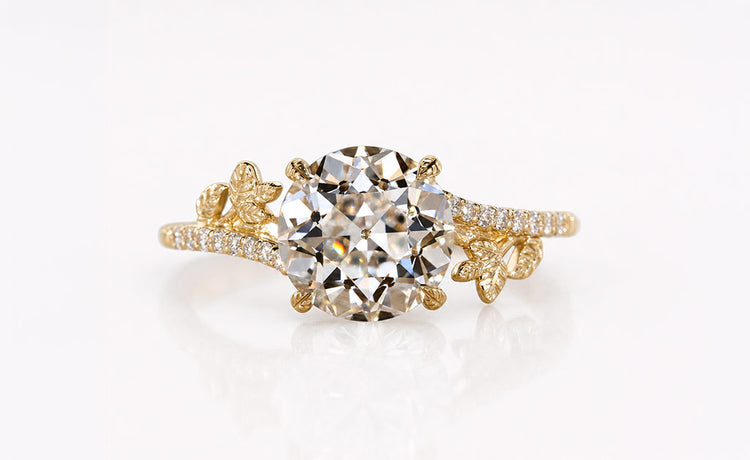 Old European cut lab grown diamond ring with a pave set diamond band