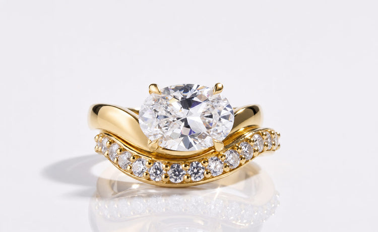Oval cut lab grown diamond bridal set with a matching engagement ring and band