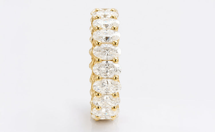 Oval cut moissanite wedding ring in solid gold