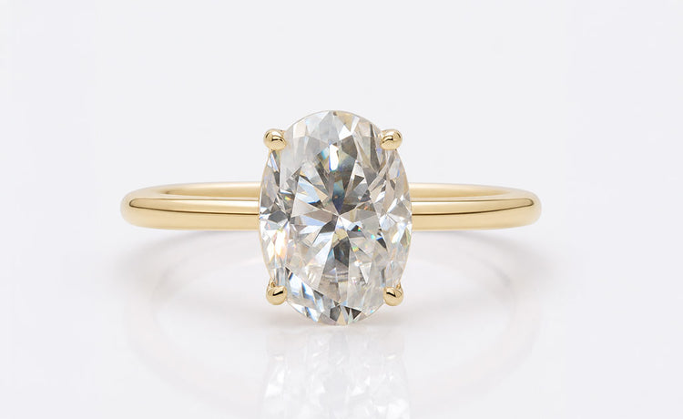 Loose oval cut moissanite with an elongated brilliant faceting pattern
