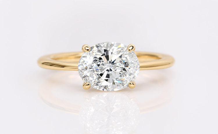 Oval cut lab grown diamond jewellery including rings, pendants and earrings