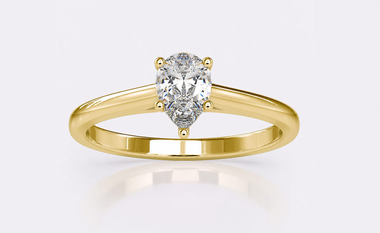 Pear cut moissanite jewellery including rings, pendants and earrings