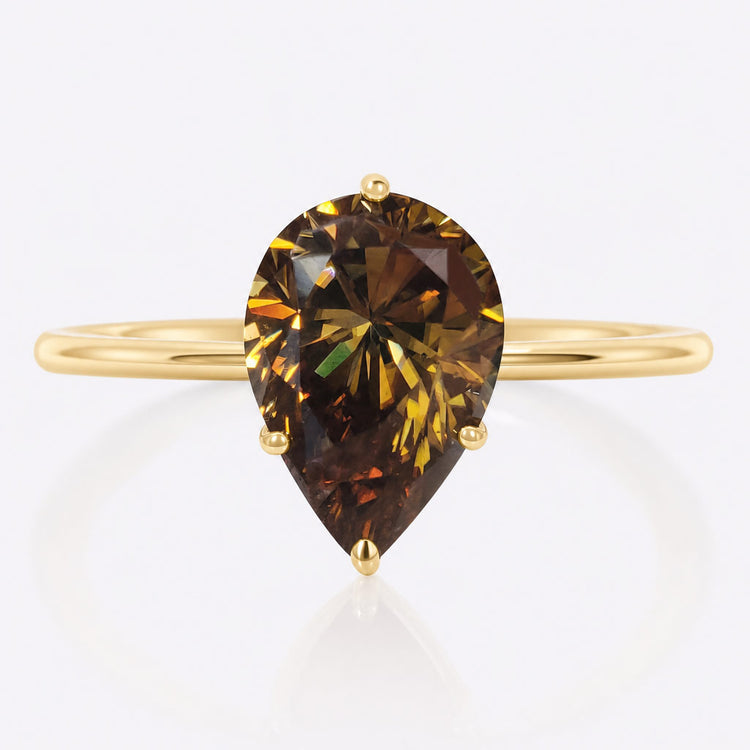 Loose pear cut moissanite with a teardrop outline and brilliant faceting