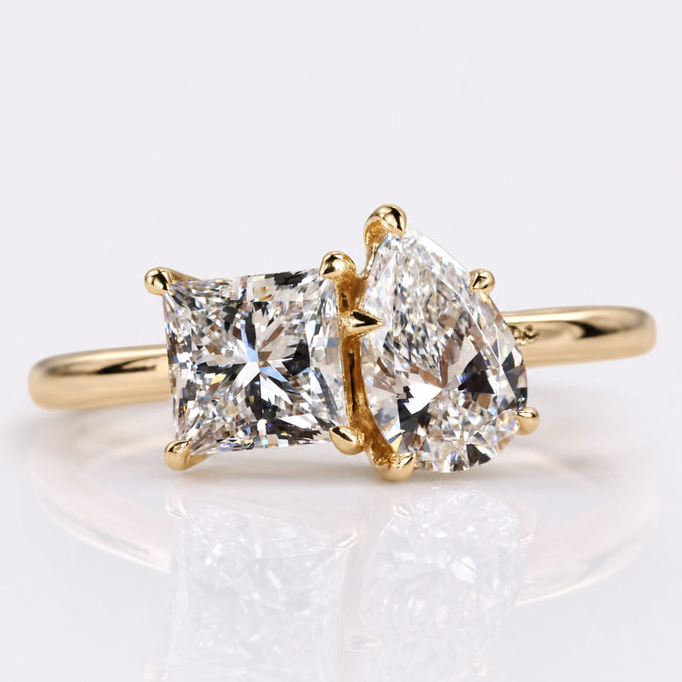 Pear cut lab grown diamond toi et moi ring with two stones set side by side