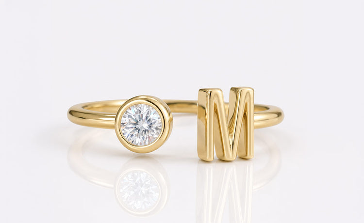 Personalised moissanite wedding band with custom letter detailing in solid gold