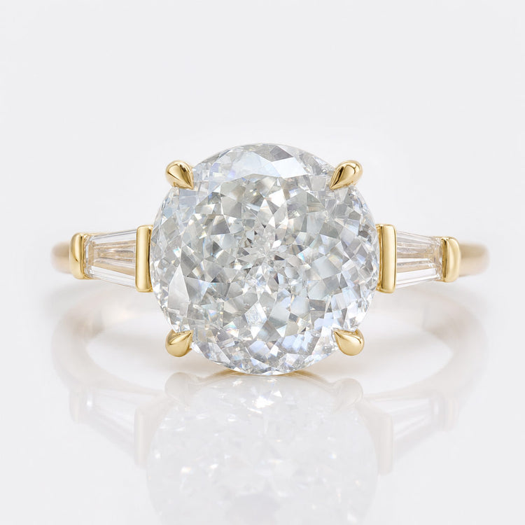 Portuguese cut moissanite engagement ring with layered brilliant faceting