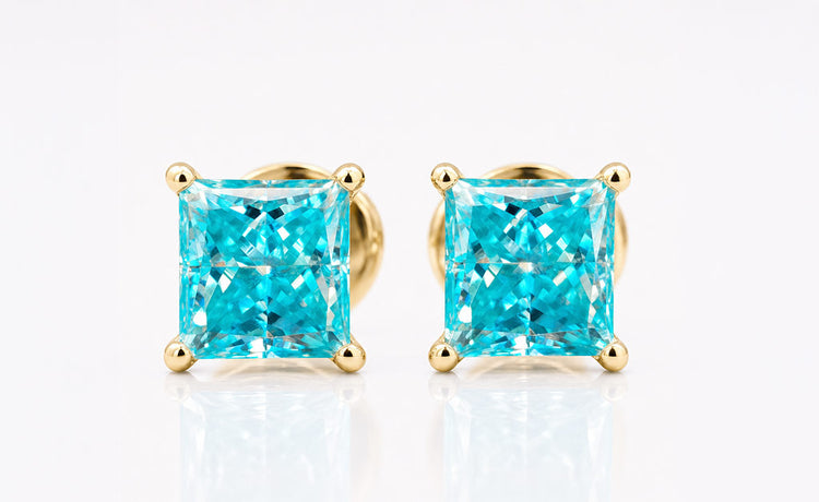 Princess cut coloured moissanite ring with a tinted centre stone in solid gold