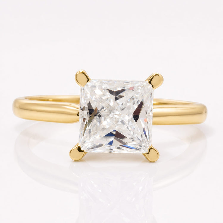 Princess cut moissanite engagement ring with a square centre stone in gold