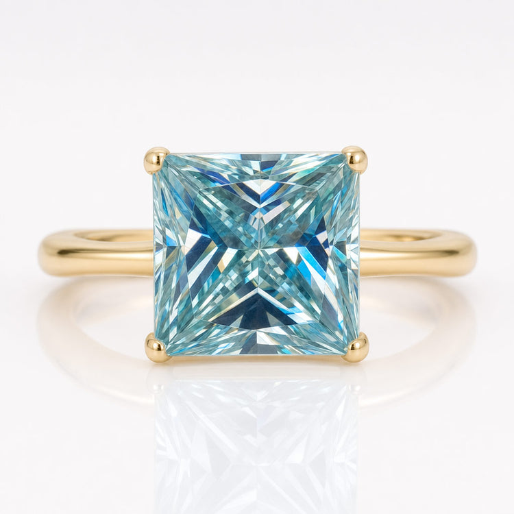 Loose princess cut moissanite with a square outline and brilliant faceting