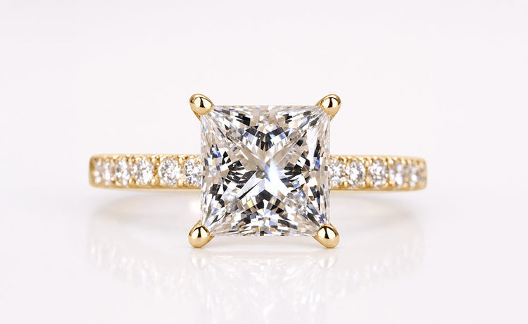 Princess cut lab grown diamond ring with a pave set diamond band