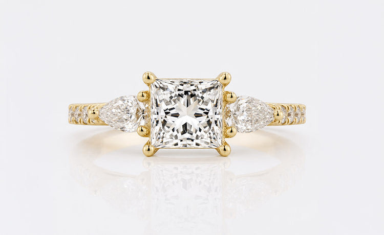 Princess cut lab grown diamond three stone ring with two side stones