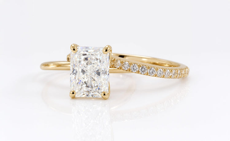 Radiant cut moissanite bridal set with a matching engagement ring and band