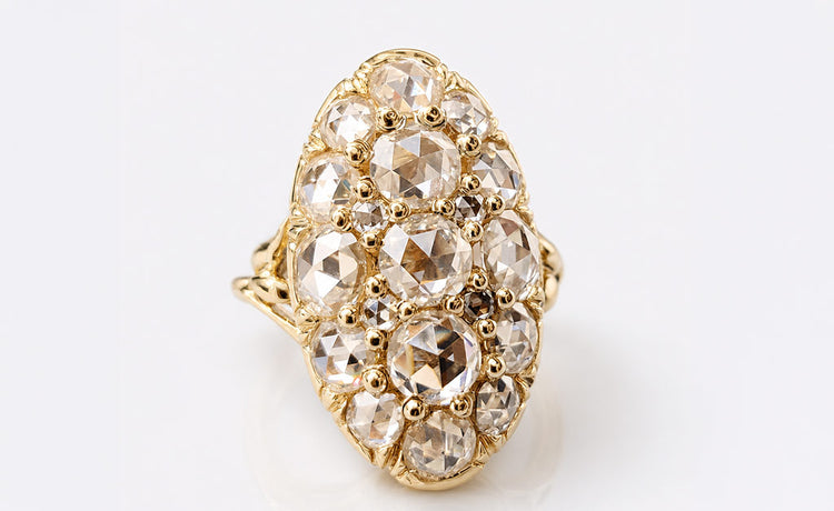 Antique style rose cut moissanite ring with milgrain detailing in solid gold