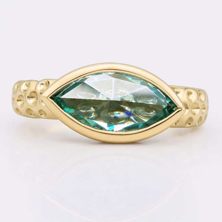 Rose cut coloured moissanite ring with a tinted centre stone in solid gold