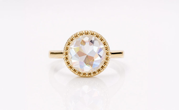 Rose cut moissanite stud earrings in solid gold settings