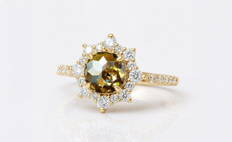 Rose cut moissanite halo ring framed by pave set stones