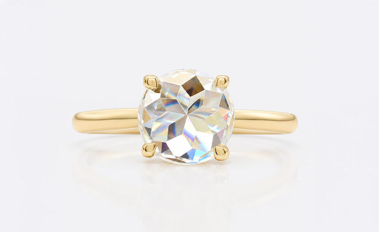 Rose cut moissanite ring with a flat base and soft vintage sparkle