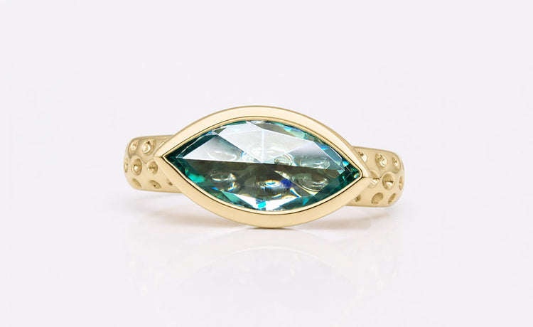 Rose cut moissanite solitaire ring on a plain solid gold band