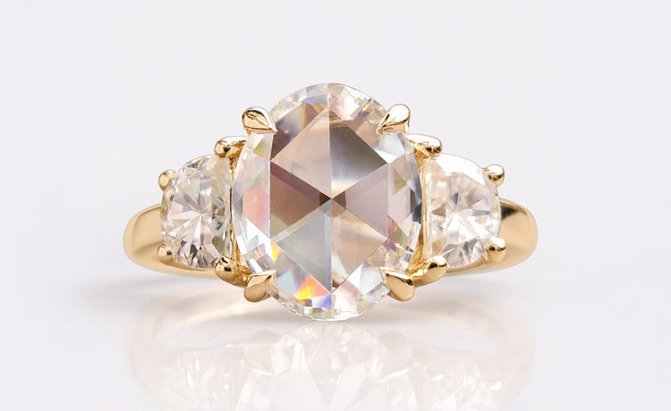 Rose cut moissanite three stone ring with a centre stone and two side stones