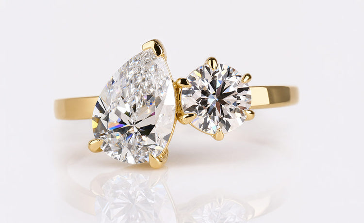 Round cut lab grown diamond toi et moi ring with two stones set side by side