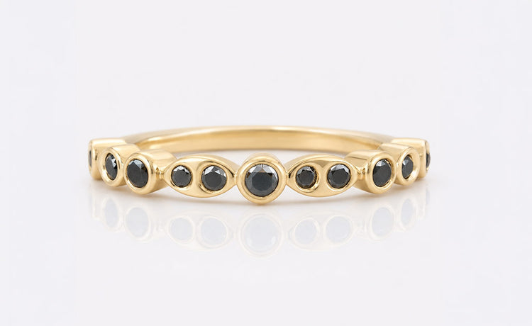 Round cut moissanite wedding ring in solid gold