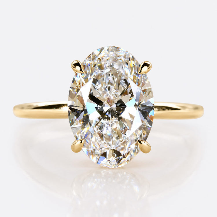 Solitaire engagement ring with a single centre stone on a plain gold band