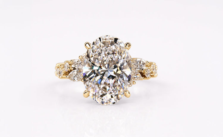 Statement stone ring with an oversized centre gemstone in solid gold