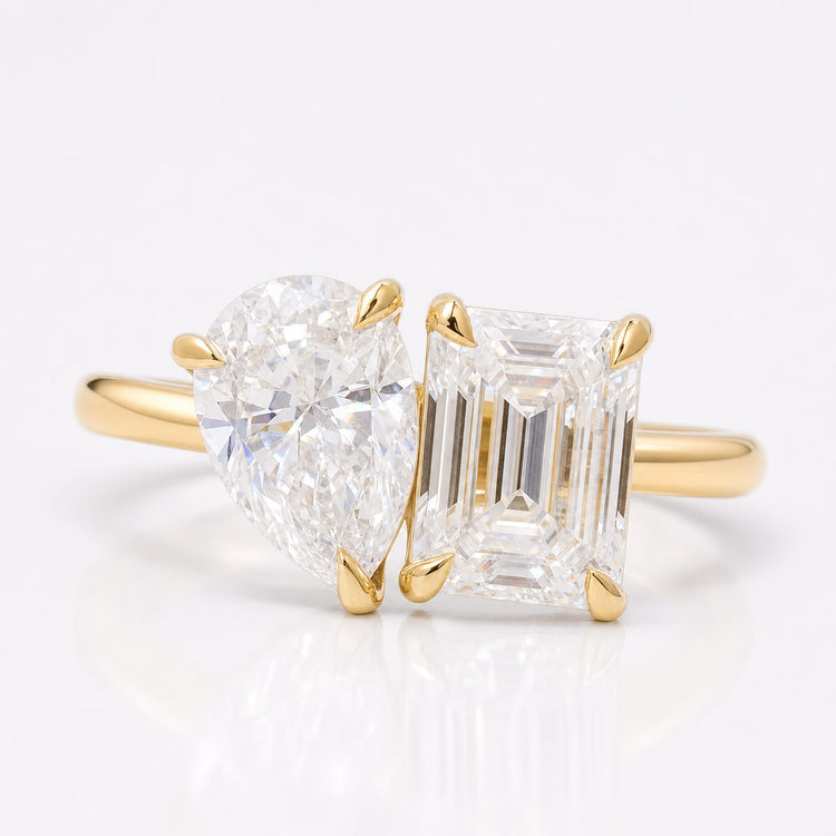 Toi et moi rings with two stones set side by side in solid gold